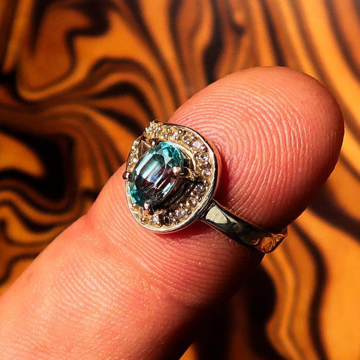 Sterling Silver Solitaire Loop Ring with oval Cut Blue Zircon and 21 CZ - Size 5-2