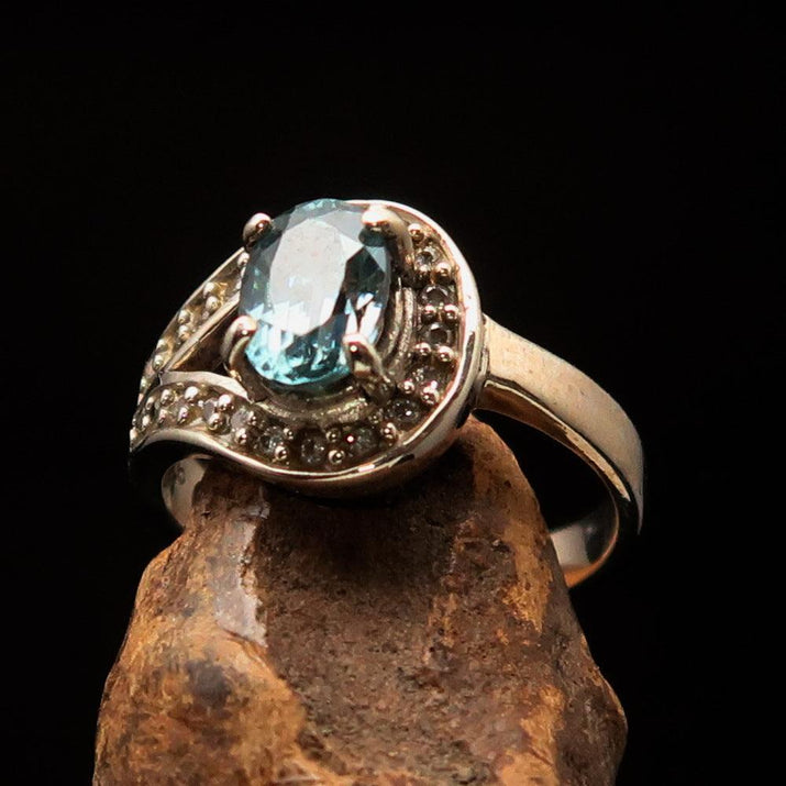 Sterling Silver Solitaire Loop Ring with oval Cut Blue Zircon and 21 CZ - Size 5-4